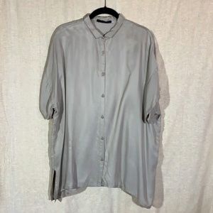 Oversized soft and flowing short sleeve top.